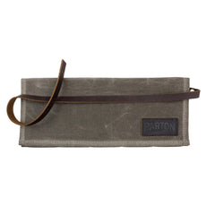 Olive waxed canvas watch roll folded flat with brown leather tie