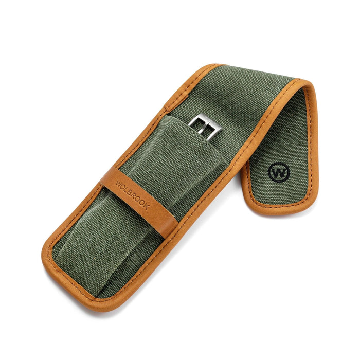 Green canvas single watch pouch with tan leather trim, flap open showing strap buckle