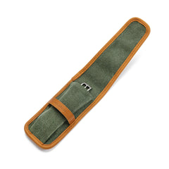 Green canvas single watch pouch laid flat with tan leather band